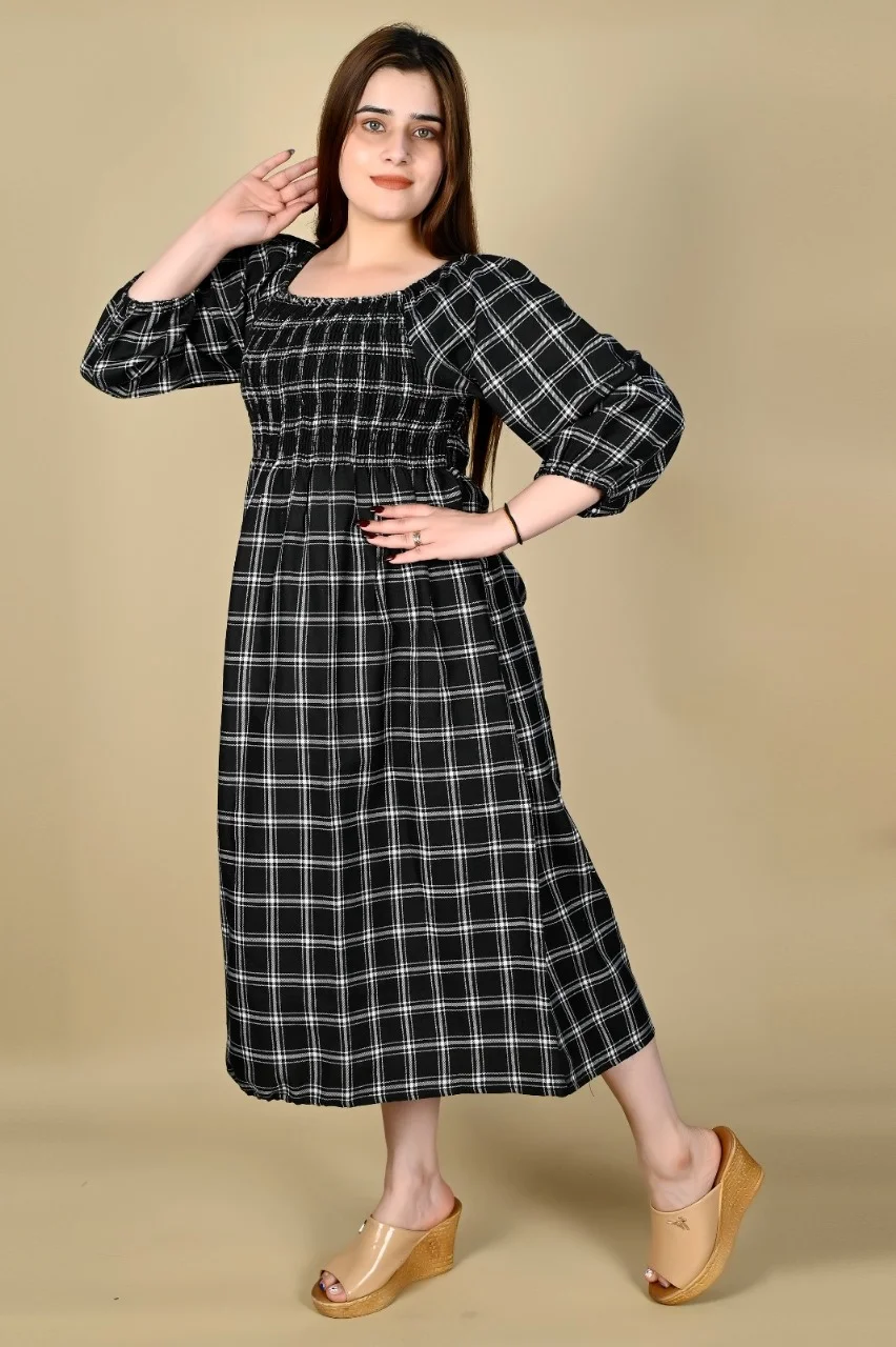 Timeless Style: The Black & White Plaid Midi Dress